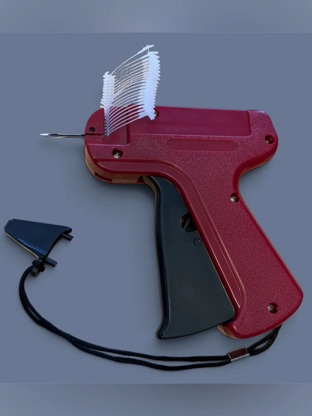 Burgundy Tagging Gun with Black Handle for Easy Price Labeling